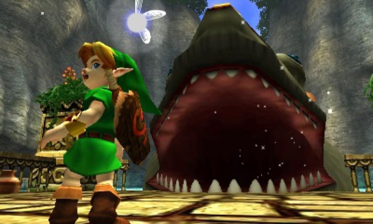 Link vänder sig för att fly från Jabu-Jabu när den gigantiska fisken förbereder sig för att andas in honom i The Legend of Zelda: Ocarina of Time 3d