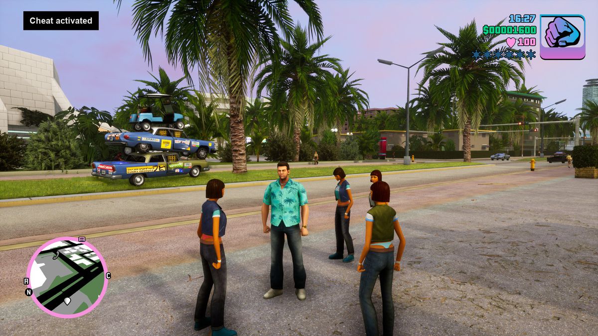 Tommy Vercetti is surrounded by pedestrians in GTA Vice City Definitive Edition