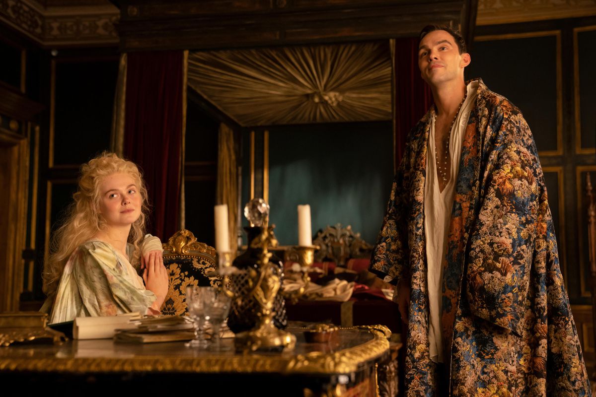 Catherine (Elle Fanning) and Peter (Nicholas Hoult), in an opulent bedroom on The Great. 
