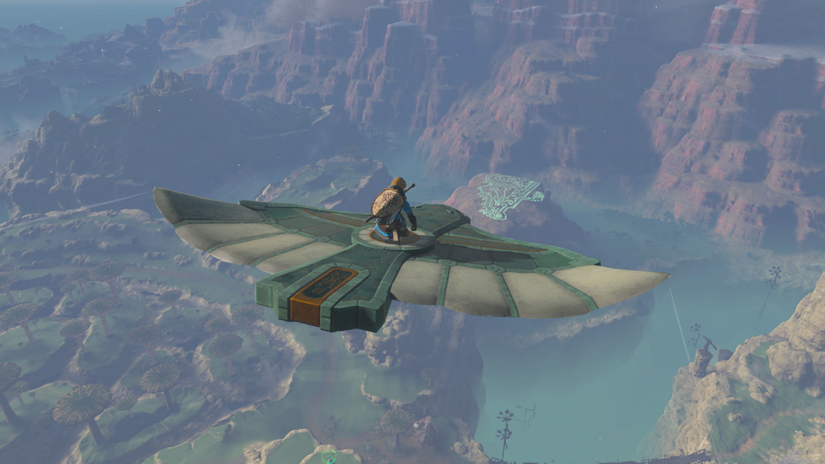 A screenshot from The Legend of Zelda: Tears of the Kingdom showing Link riding on a bird-like flying vehicle.