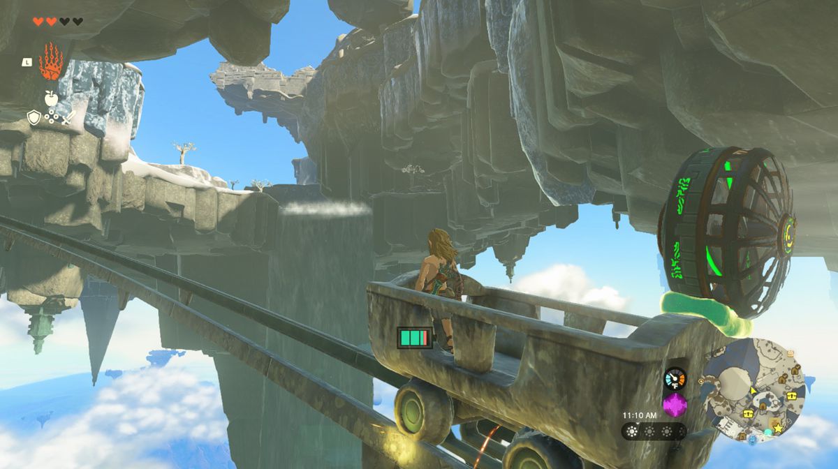 Link åker gruvvagn med en fläkt på Great Sky Island i Zelda Tears of the Kingdom.