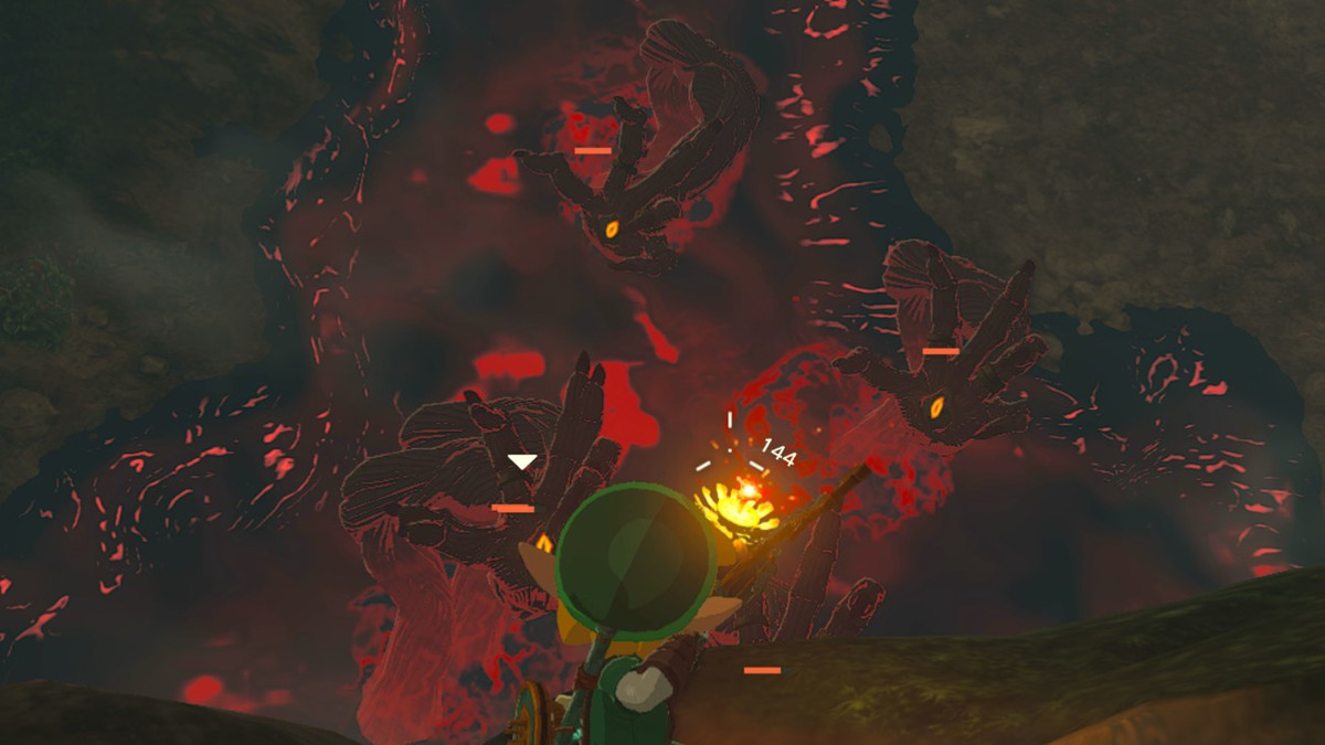 Link skjuter en bombpil från högre mark in i mitten av fem Gloom Hands i The Legend of Zelda: Tears of the Kingdom