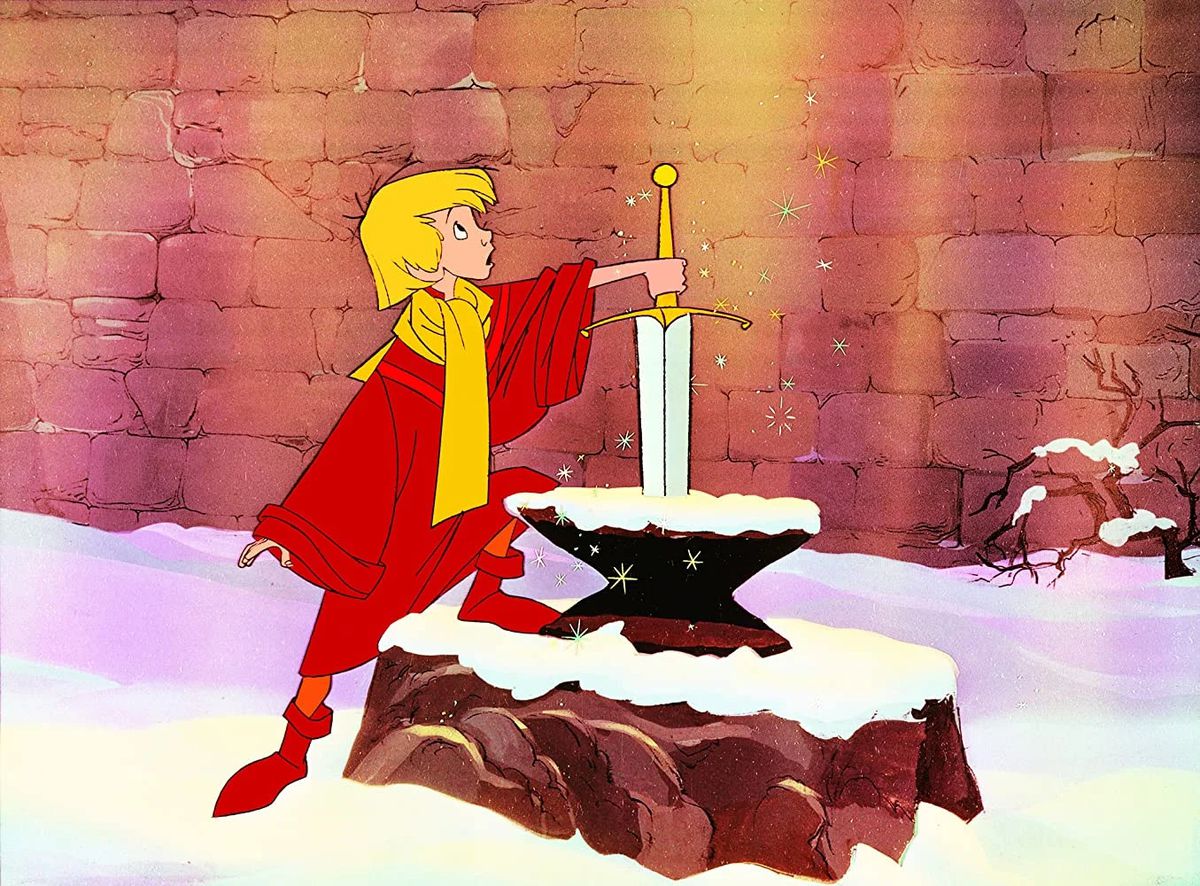 En ung animerad pojke i röd outfit står med handen på fästet av ett svärd inbäddat i en sten i Svärdet i stenen.