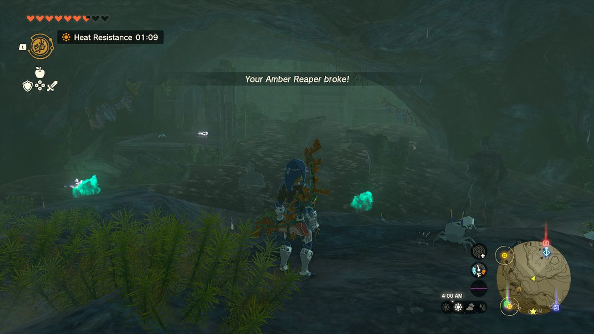 Link står framför ett översvämmat rum med statyer och ruiner i Zelda: Tears of the Kingdom