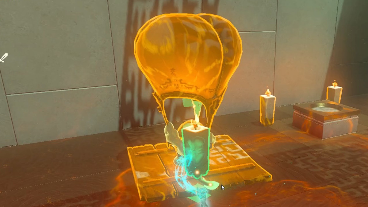 En luftballong som håller en liten boll och en fackla i Sinakawak Shrine i The Legend of Zelda: Tears of the Kingdom