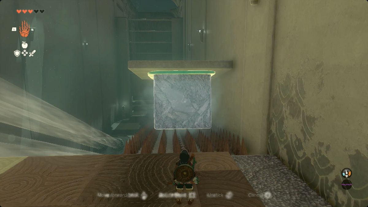 The Legend of Zelda: Tears of the Kingdom ett gigantiskt isblock med en stenpanel på toppen som glider längs en spetsig sluttning i Kiuyoyou Shrine