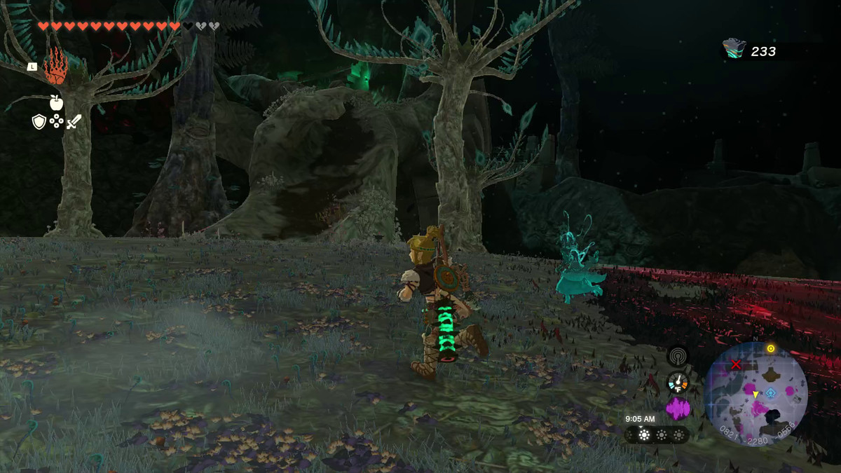 Link runs towards a dirty-looking back in the Depths between two trees in Tears of the Kingdom