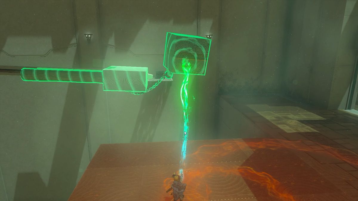 Stock fäst vid ett block fäst vid en metallkula fäst vid en stor metallkub i Musanokir Shrine i The Legend of Zelda: Tears of the Kingdom