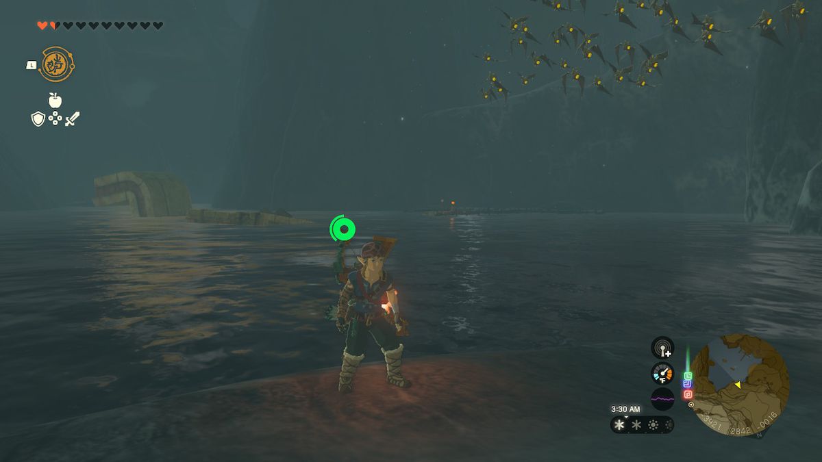Link står framför Lake Kilsie Cave och tittar bakåt i Zelda: Tears of the Kingdom