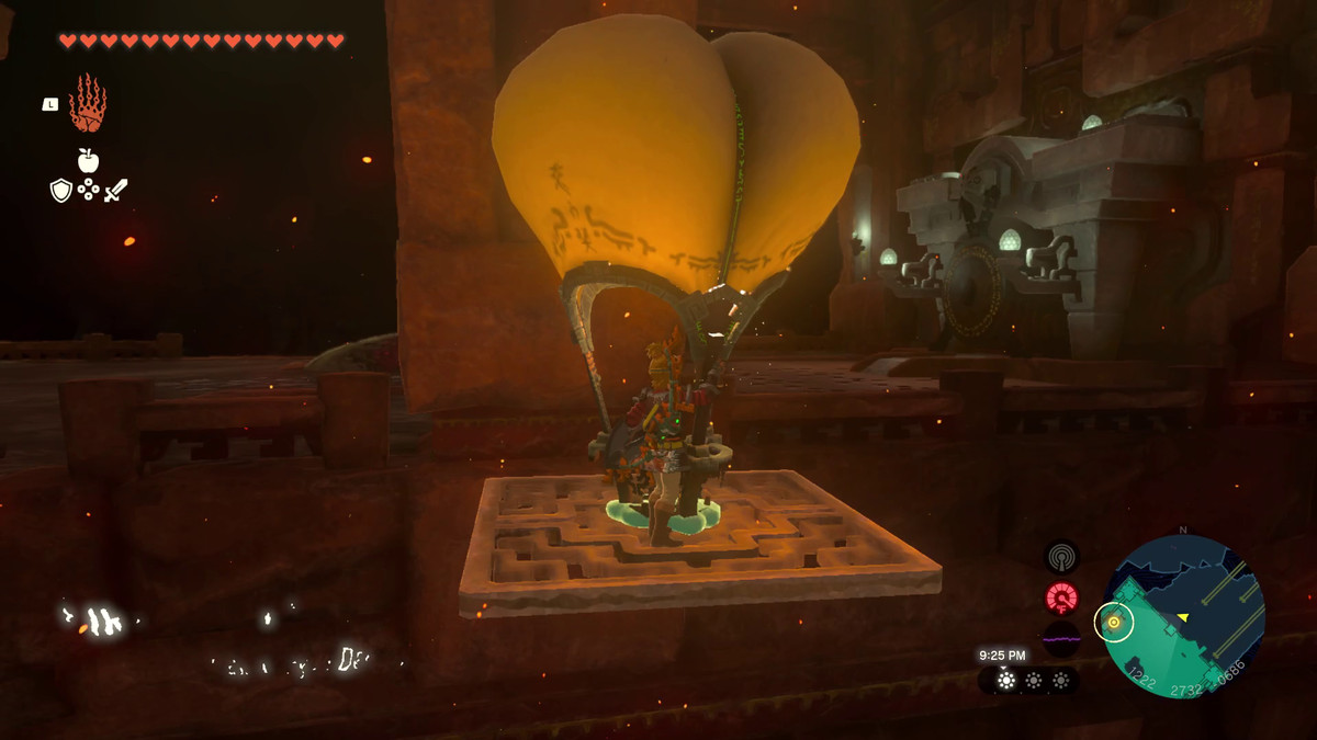Link rides a hot air balloon up in the Fire Temple, to see a gong in Tears of the Kingdom.