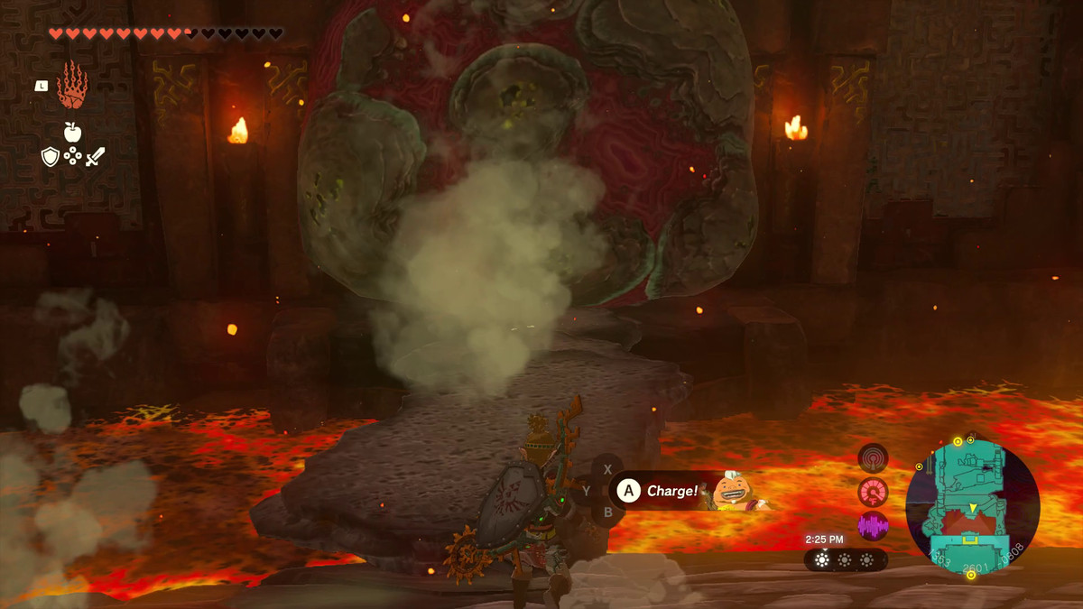 Link creates a lava rock bridge over lava to shoot Yunobo at a molten rock in in Tears of the Kingdom