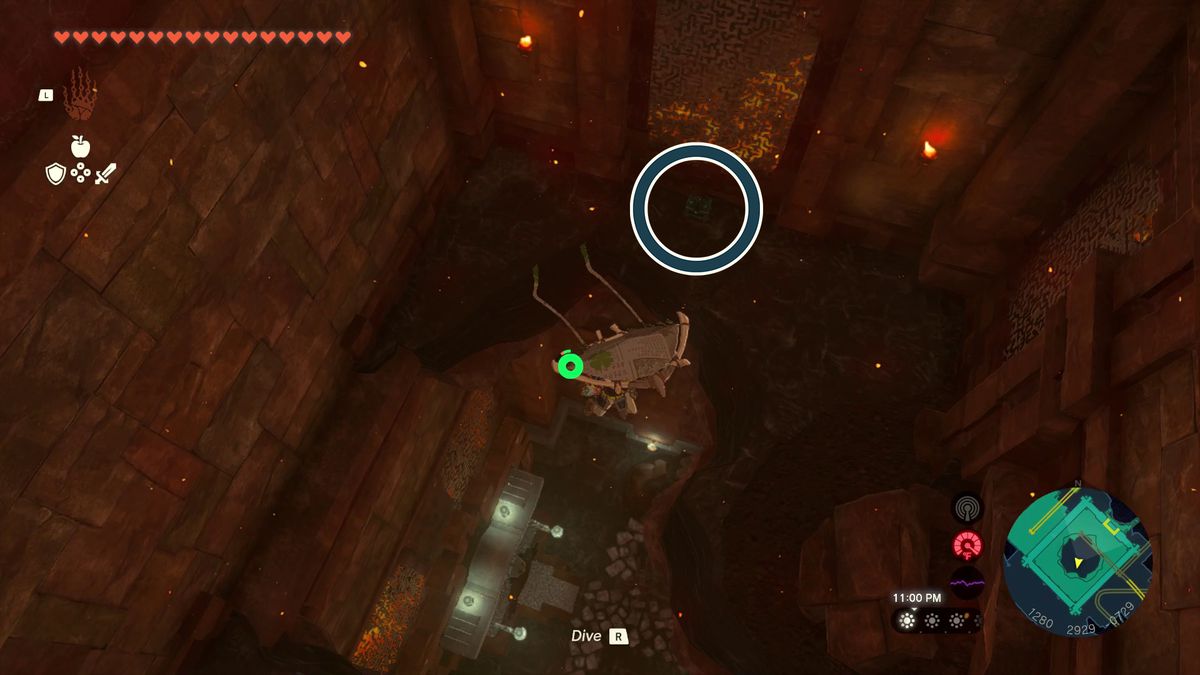 A blue circle points out a faint Zonai chest on the ledge of a room in the Tears of the Kingdom Fire Temple.