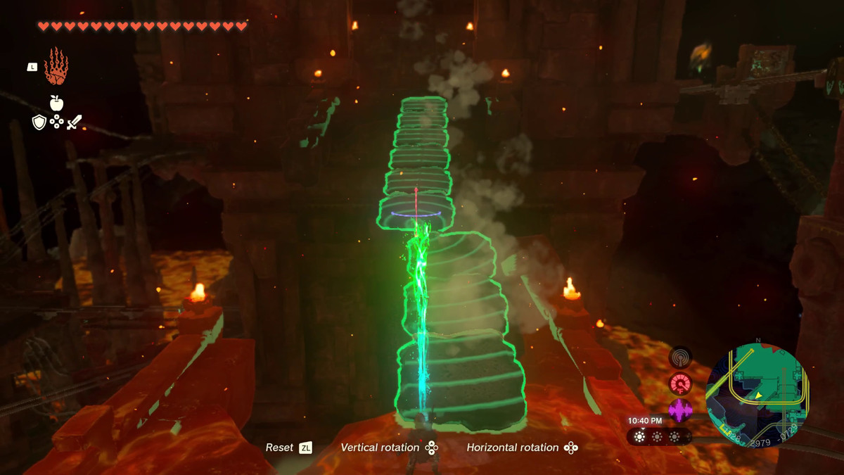 Link uses Ultrahand in Tears of the Kingdom to build an even longer bridge, covering up a hole that would otherwise lead to lava.