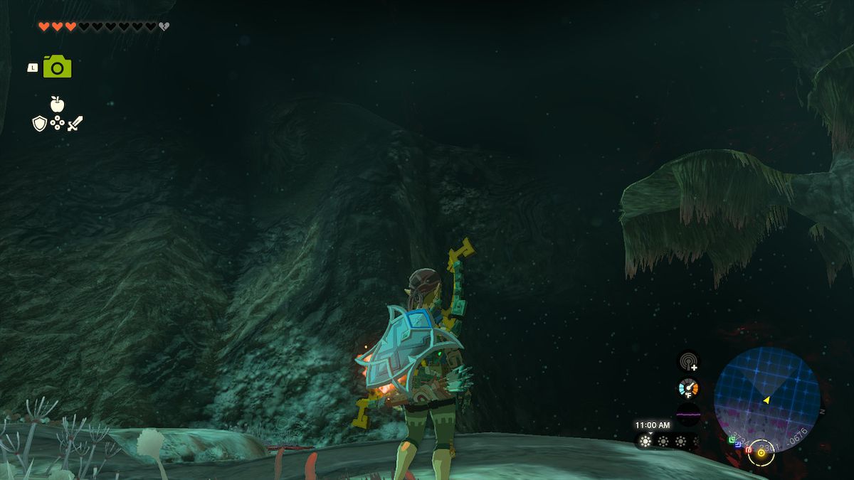 Link stands next to a massive wall that can be climbed using the trees in Zelda: Tears of the Kingdom