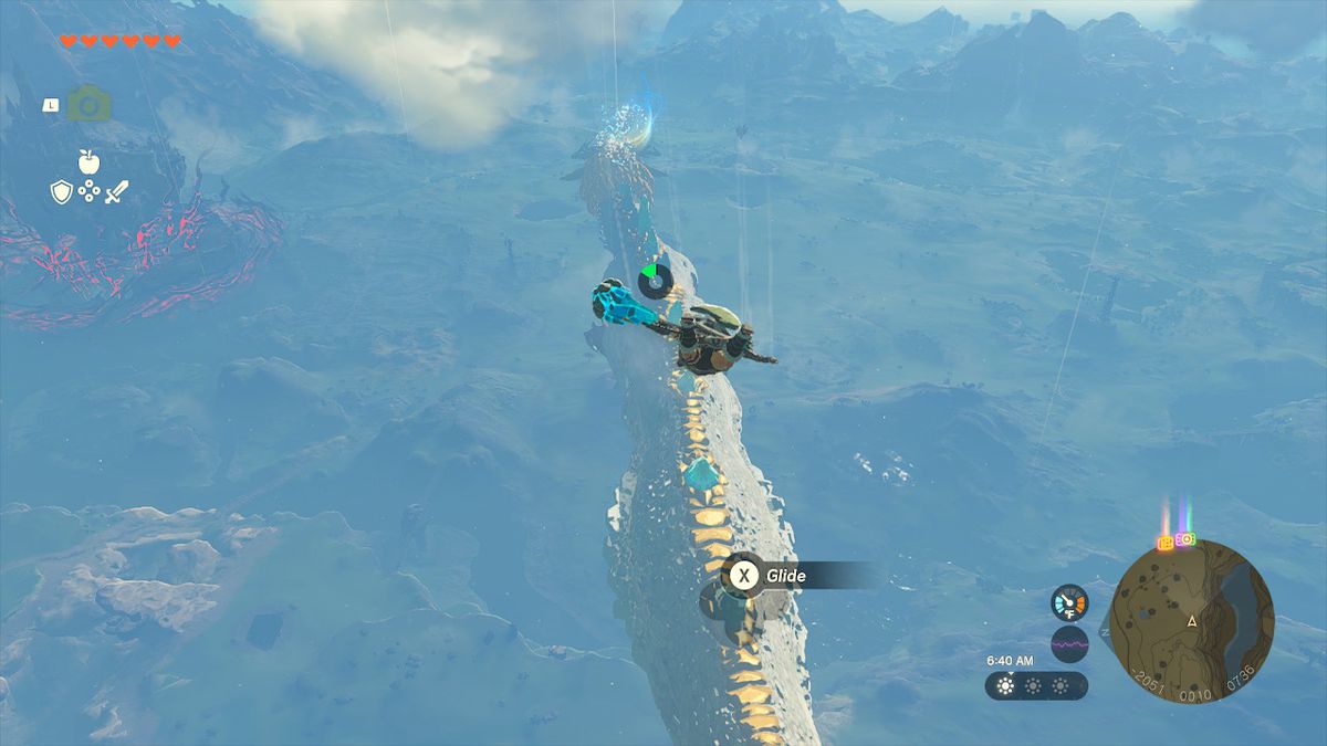 Link glider i luften och förbereder sig för att landa på baksidan av Light Dragon i Zelda: Tears of the Kingdom