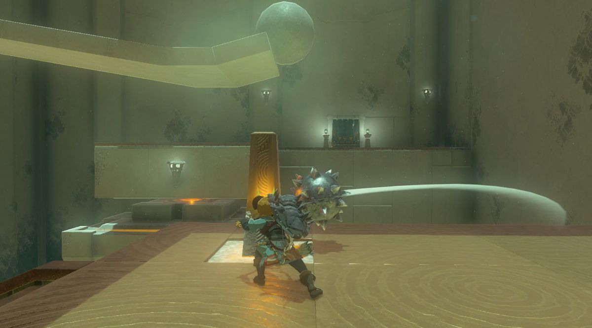 Link trycker på en knapp med en stor taggig boll för att låta en sten slå sönder en knapp i Mayak Shrine i Zelda: Tears of the Kingdom