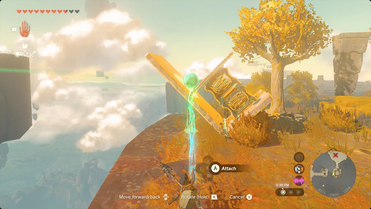 The Legend of Zelda: Tears of the Kingdom Link använder Ultrahand för att placera East Necluda-himmelkristallen på en fjäderdriven bärraket