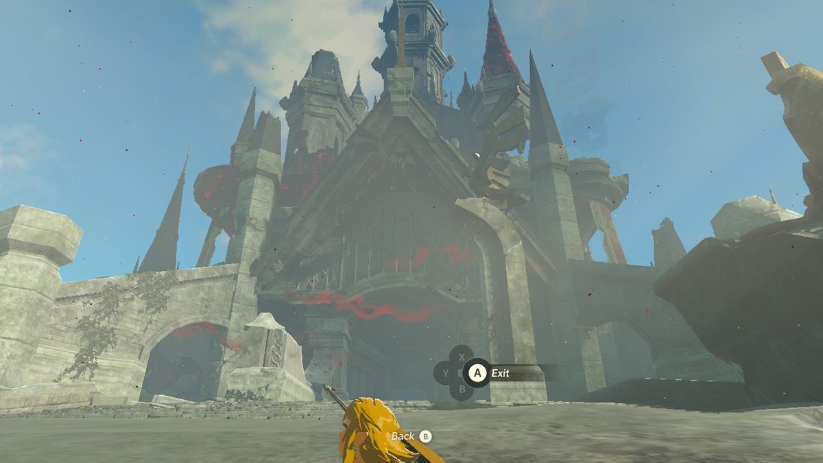 Link använder Ascend för att dyka upp från en sten vid Hyrule Castle i Zelda Tears of the Kingdom.