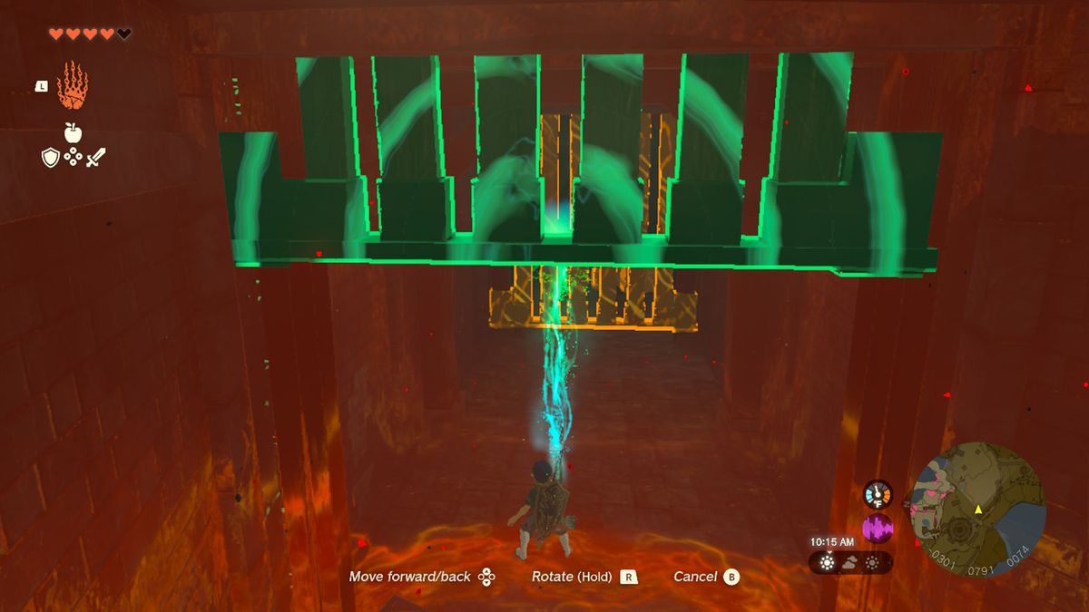 Link använder Ultrahand för att lyfta en grind i Zelda Tears of the Kingdom.