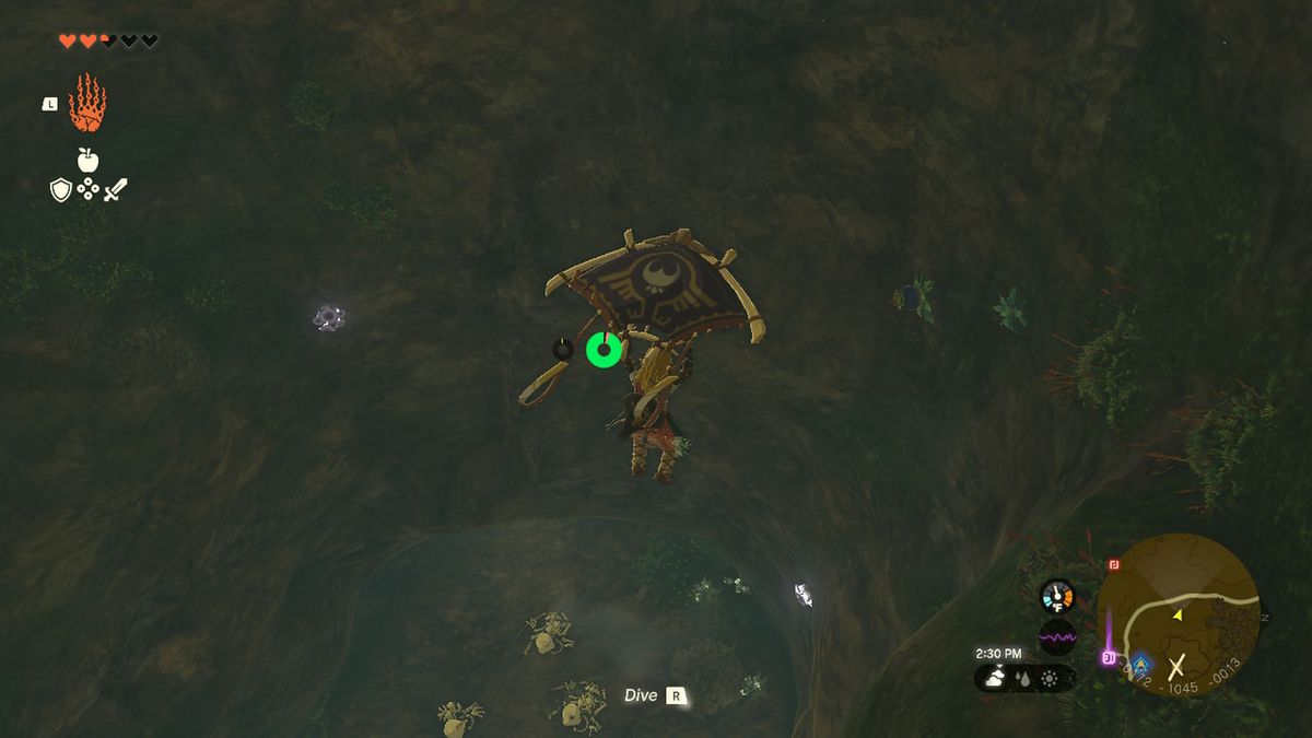 Link glider genom en grotta i Zelda Tears of the Kingdom.