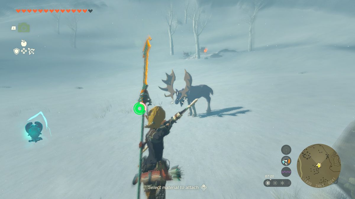 Link aiming an arrow at a moose in a snowy field