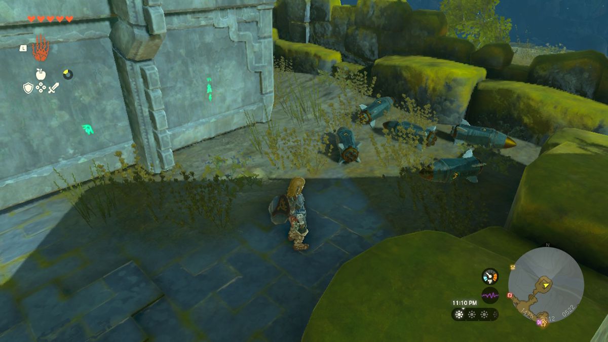 Link stands near some Zonai devices during nighttime in Zelda Tears of the Kingdom.