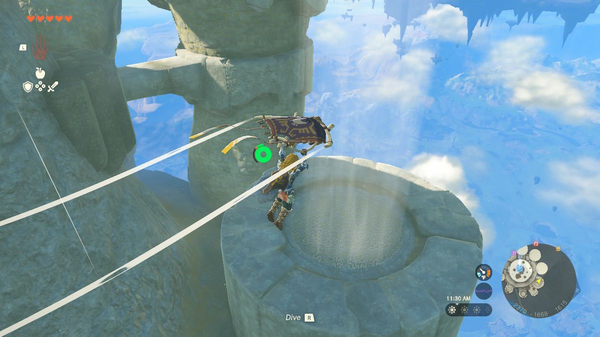 Link flies a paraglider into an updraft in Zelda Tears of the Kingdom.