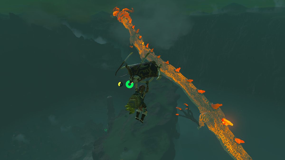 Länk skärmflyg runt Dinraal, en av drakarna i Zelda: Tears of the Kingdom