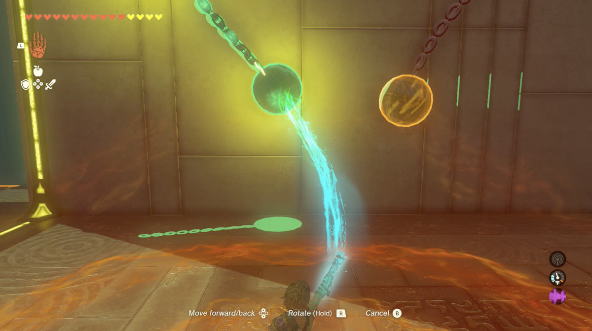 En bild av ett pussel i The Legend of Zelda: Tears of the Kingdom.  Link använder Ultrahand för att limma en elektrifierad hängboll på en annan boll.  Den till vänster svänger fram och tillbaka. 