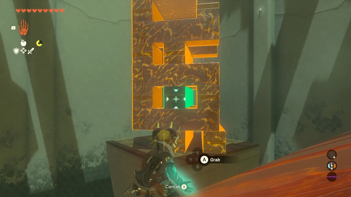 Link lyfter fram ett torn av block med sin Ultrahand-förmåga i Zelda: Tears of the Kingdom.  Blocket på tredje radens mitt lyser grönt, medan resten är orange.