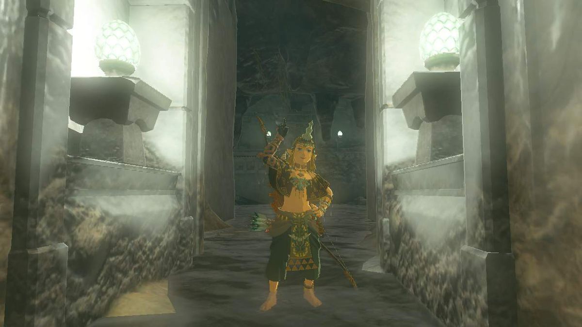 Link wears the Charged Armor while standing in a lit hallway in Zelda Tears of the Kingdom.