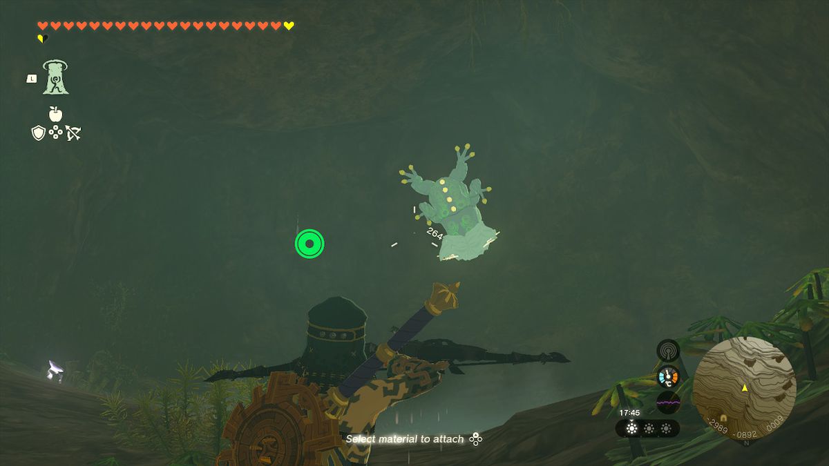 Link riktar en pilbåge mot en bubbelgroda i Tamio River Downstream Cave i Zelda Tears of the Kingdom.
