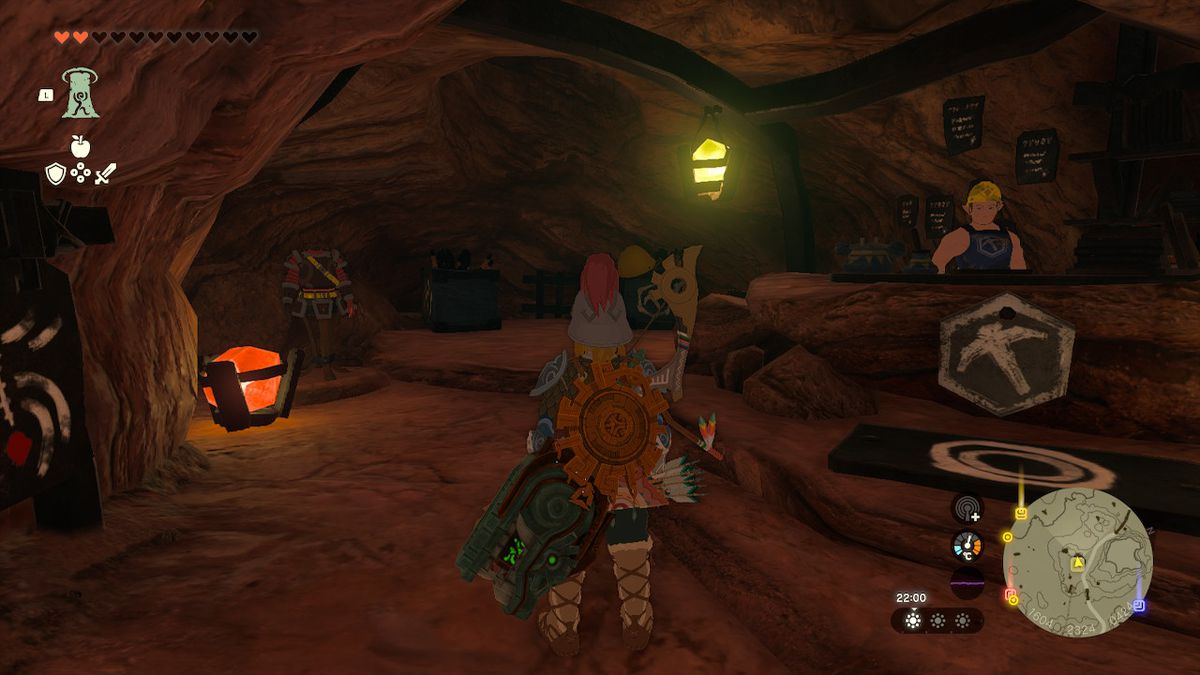 Link står nära en butik som säljer flamebreaker-rustningen i Zelda Tears of the Kingdom.