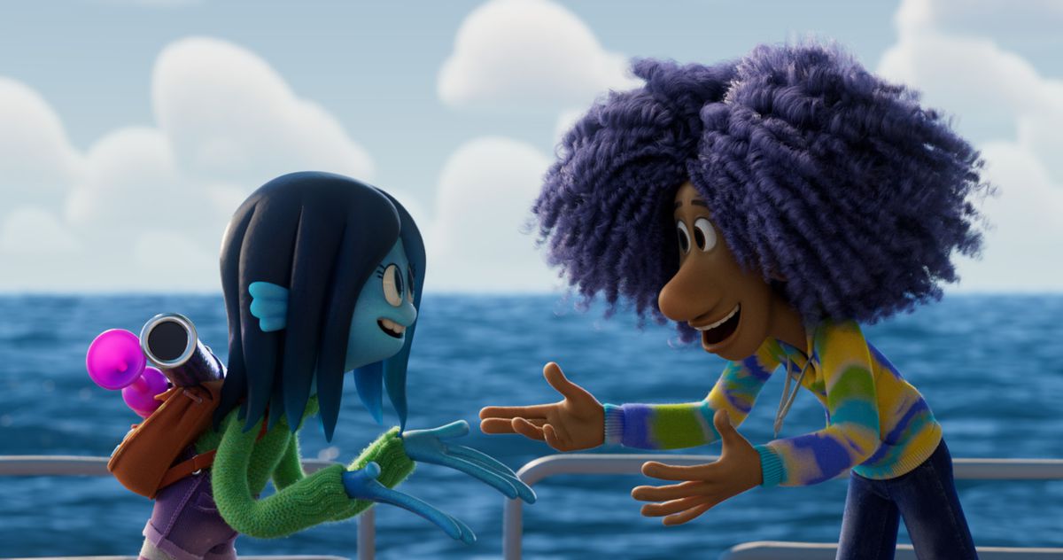 A teenage Kraken and a young boy in a multicolored sweater with purple hair in Ruby Gillman Teenage Kraken.