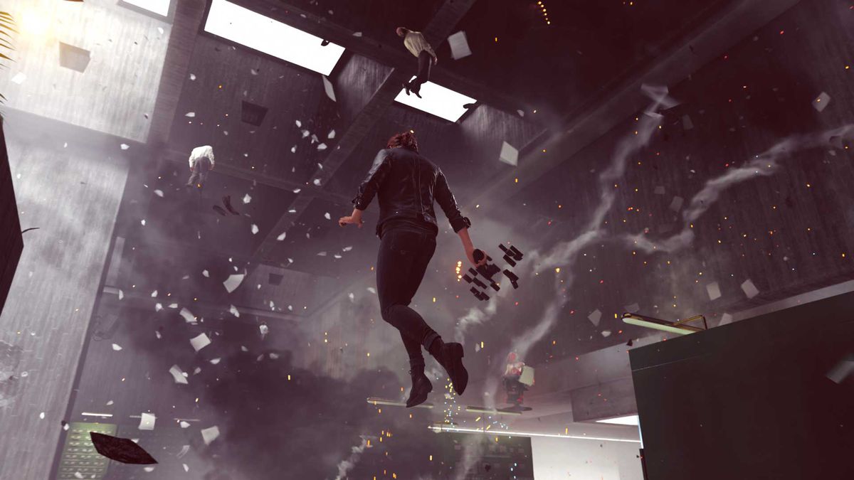 en kvinna flyter på ett kontor, med skräp flygande överallt runt henne