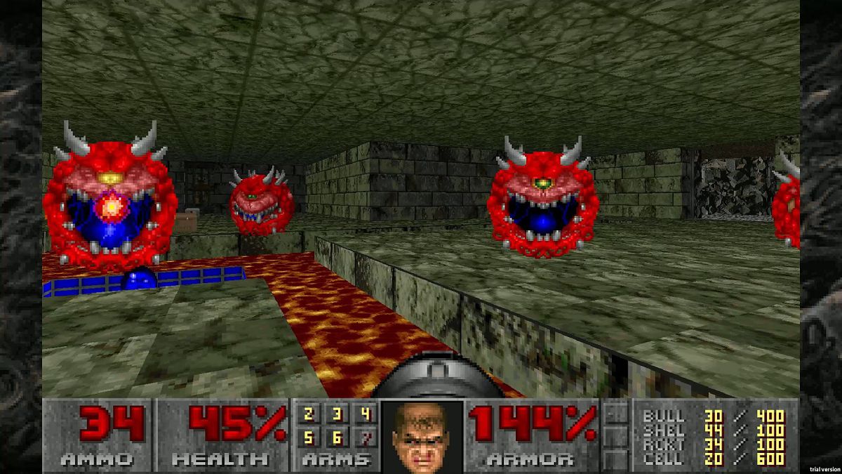 A screenshot of Doom (1993) in which the player faces four floating Cacodemons in an underground level