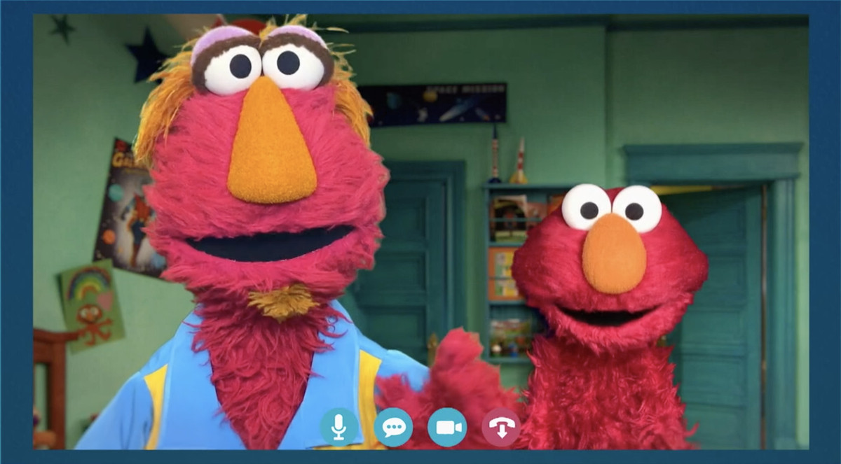 Elmos pappa, Louie och Elmo, i Sesame Street: Elmo's Playdate. 