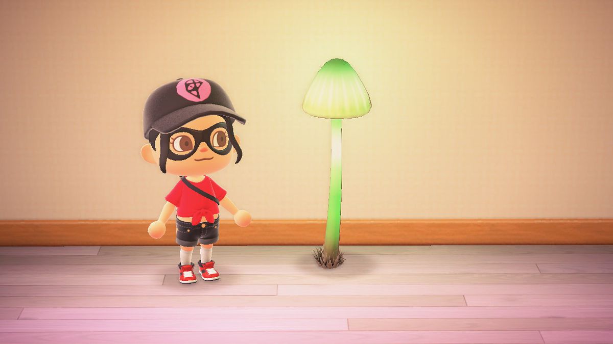 En Animal Crossing-karaktär står bredvid en grön glödande svamplampa