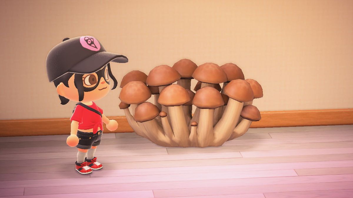 En Animal Crossing-karaktär står bredvid en stor grupp svampar