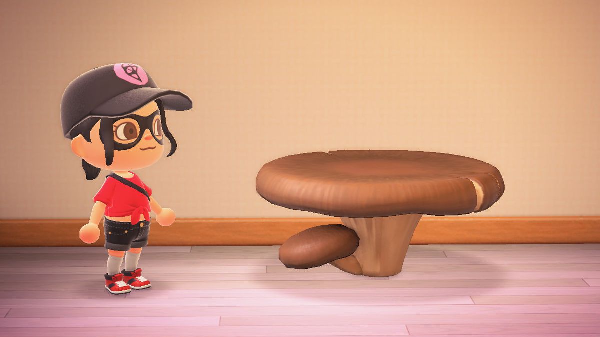 En Animal Crossing-karaktär står bredvid en bred svamp
