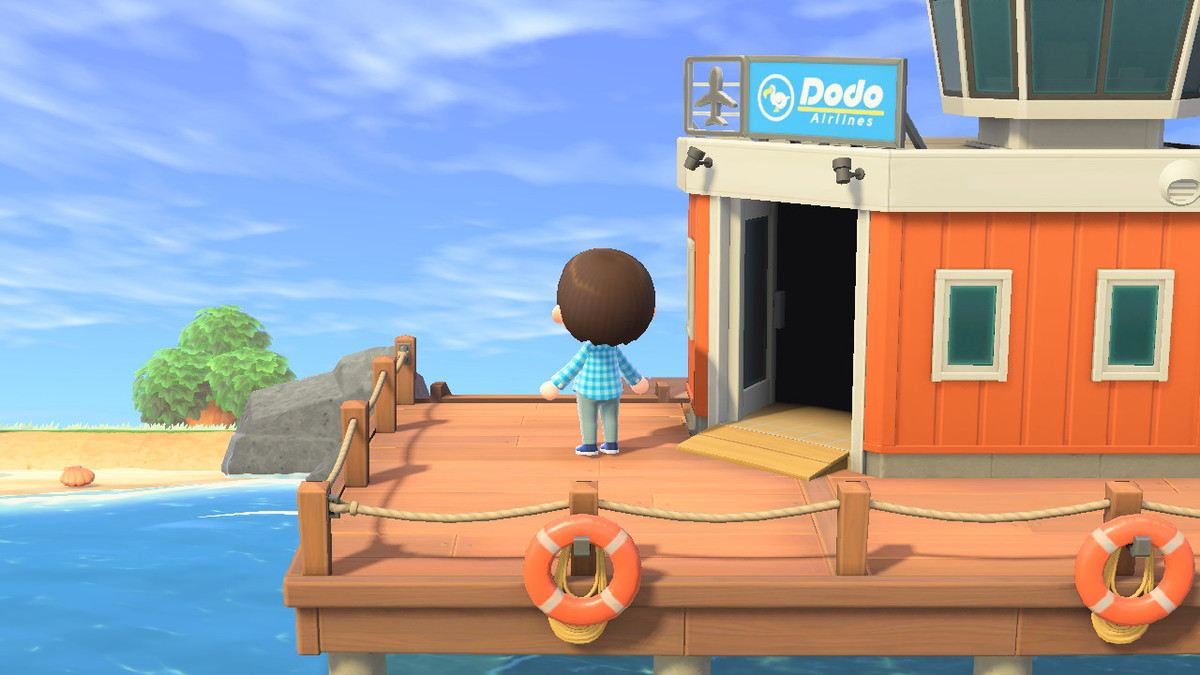 Animal Crossing: New Horizons - en spelare står på bryggan och tittar på vad som verkar vara en tom ö