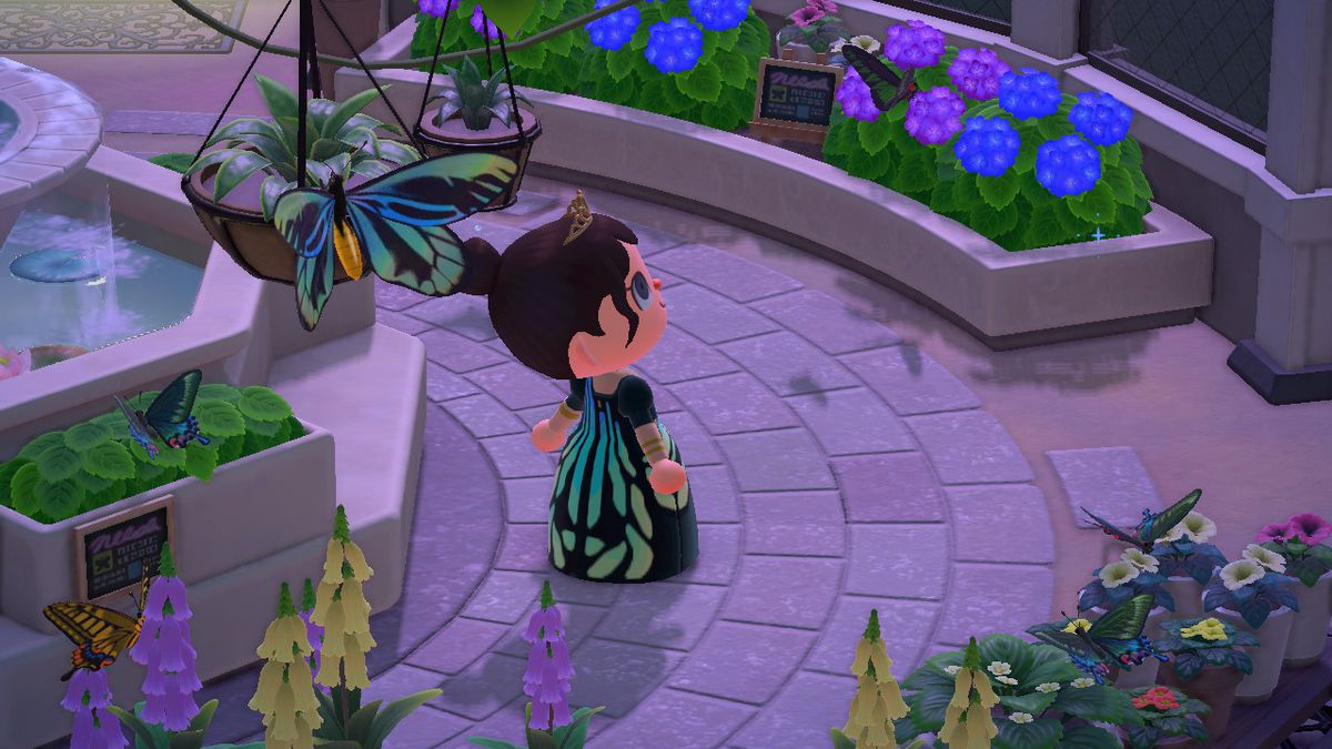 Animal Crossing - en spelare i en skräddarsydd fjärilsklänning står bredvid inspirationen i en stenplats