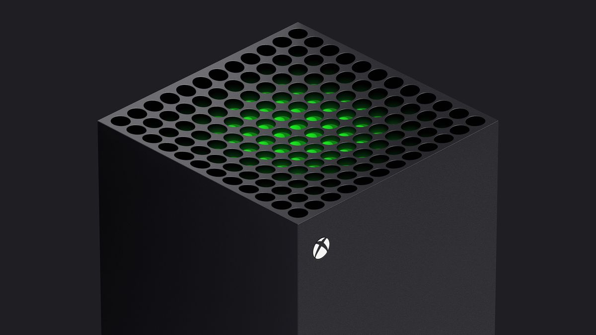 en trefjärdedelsvy av toppen av Xbox Series X, med en grön bit plast synlig precis under systemventilerna