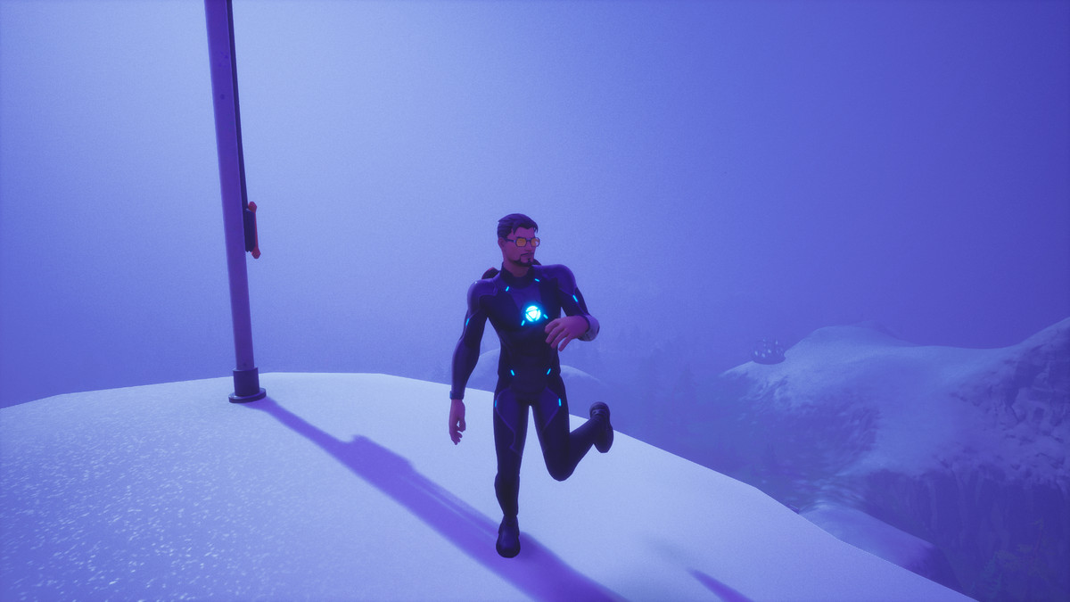 Tony Stark i Fortnite som dansar på toppen av ett berg