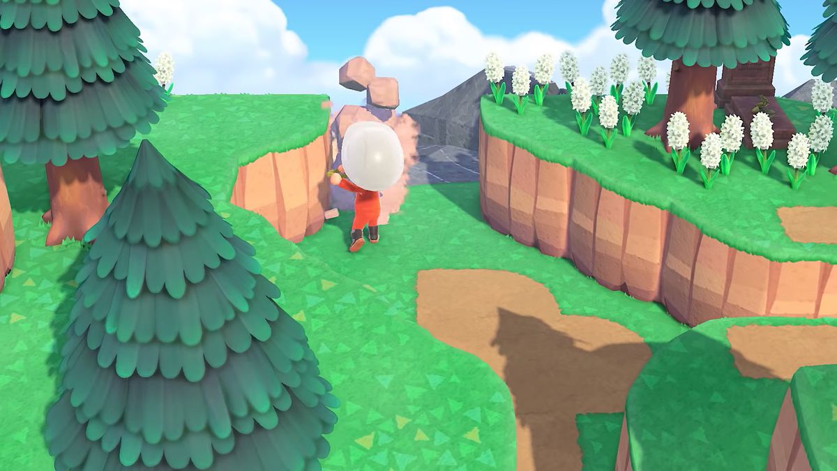 En bybor krossar stenar med en spade i en skärmdump från Animal Crossing: New Horizons.