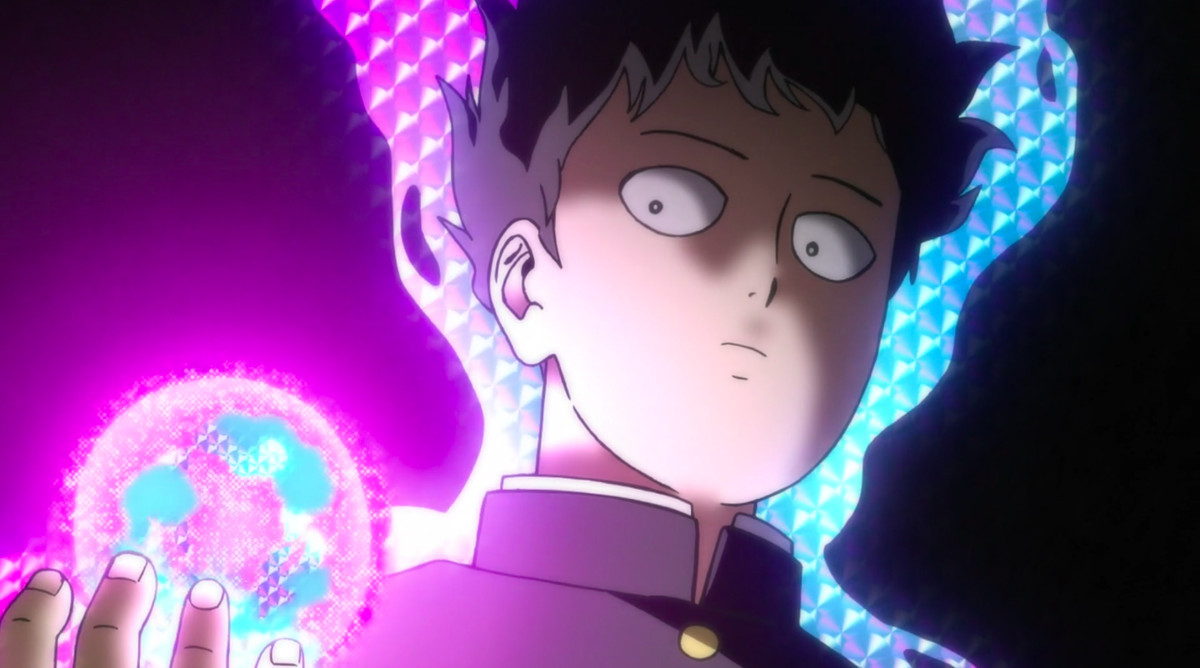 Mob, av Mob Psycho 100, är ​​omgiven av en gnistrande aura som betyder hans psykiska krafter. Hans hår svävar på grund av kraften och han vaggar en ljuskula i handflatan. Hans uttryck är allvarligt.