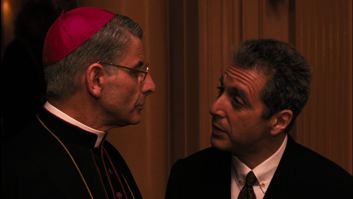 Michael Corleone pratar med en kardinal i Godfather 3