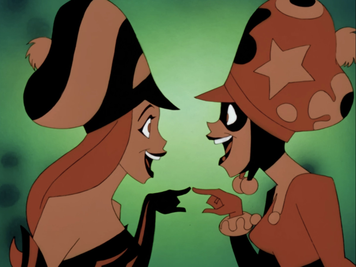 Harley Quinn and Poison Ivy, wearing ridiculous and large hats, point at each other and laugh in The New Batman Adventures. 