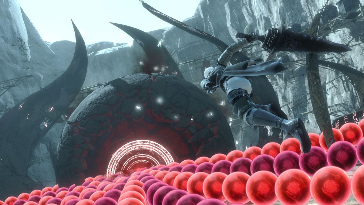 Nier battles a bullet hell boss in a screenshot from Nier Replicant’s remaster