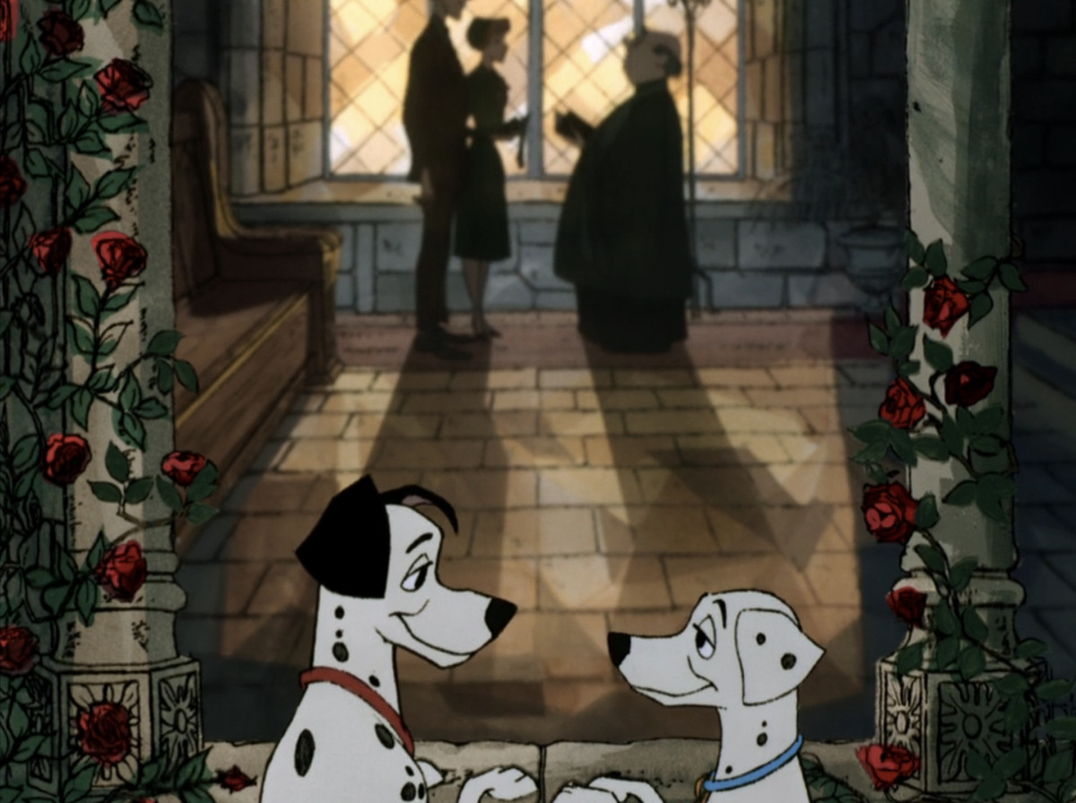 Pongo and Perdita gaze into each others eyes as their humans get married in One Hundred and One Dalmatians. 